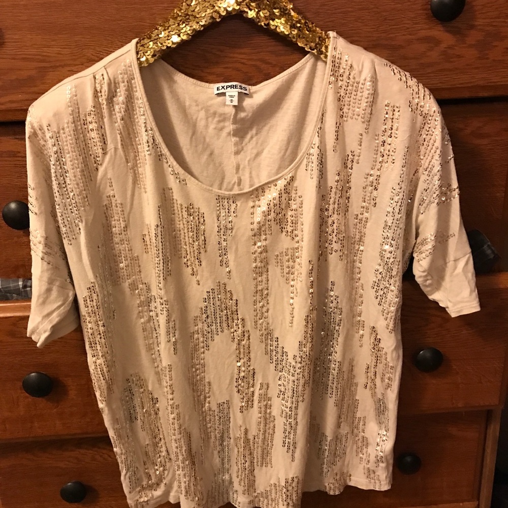 express T. Glittery.